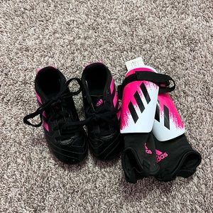 Adidas soccer cleats and shinguards